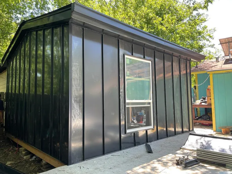 Black standing seam metal wall panels for Roof Inspection in Dumfries